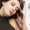 Image of attractive woman near the fireplace sleeping peacefully. High quality photo